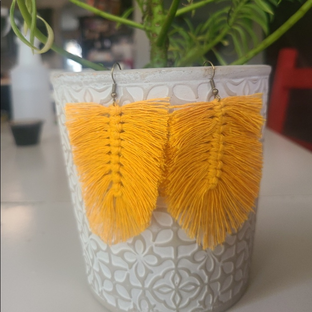 Mustard yellow feather earrings